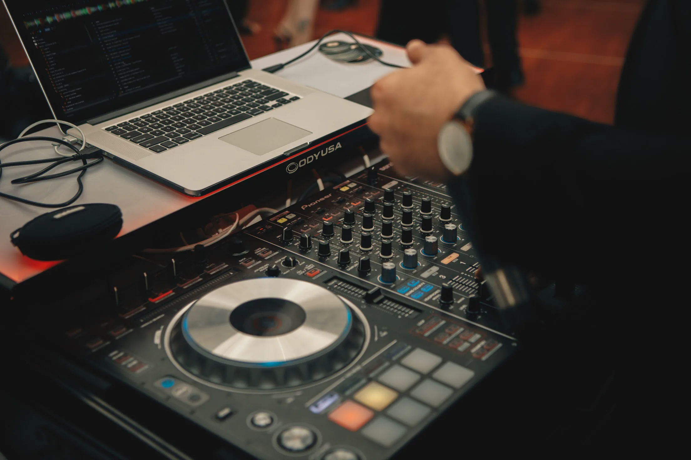 Turntables and mixer set up at an event