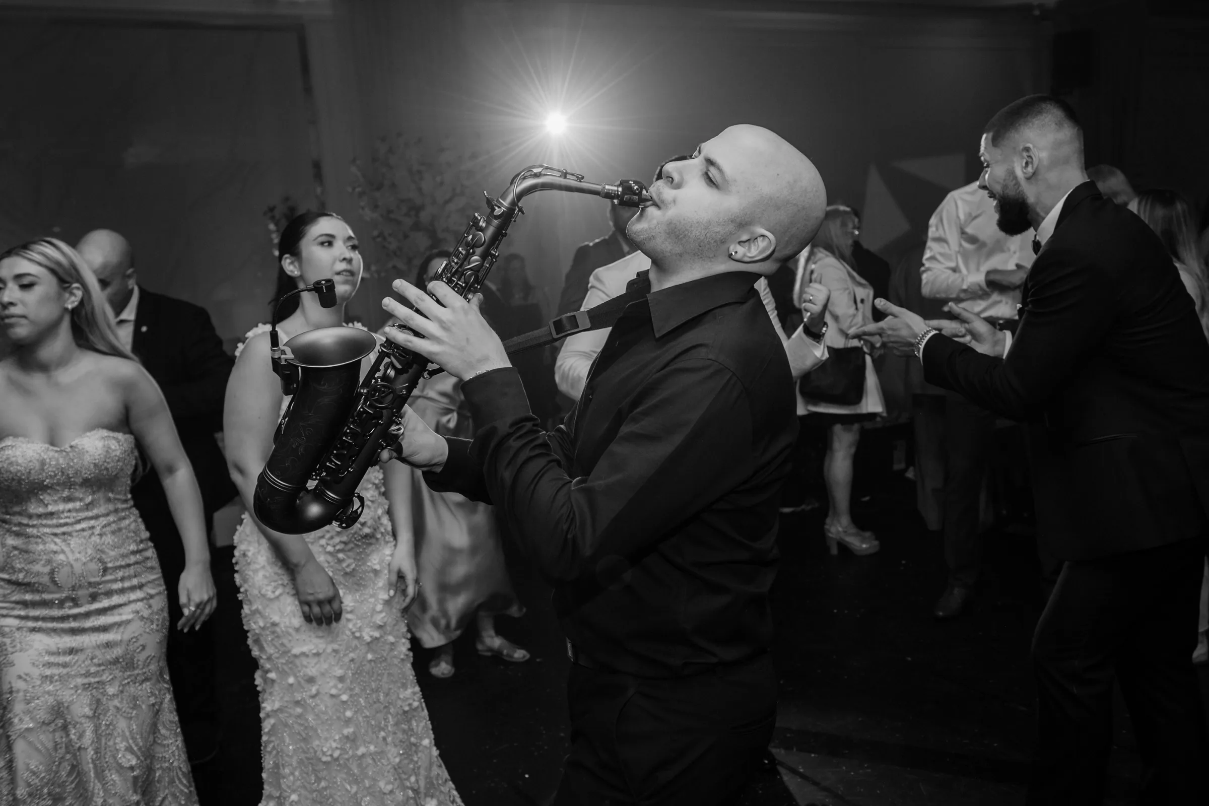 Ask for the sax Kloud playing saxophone on the dance floor